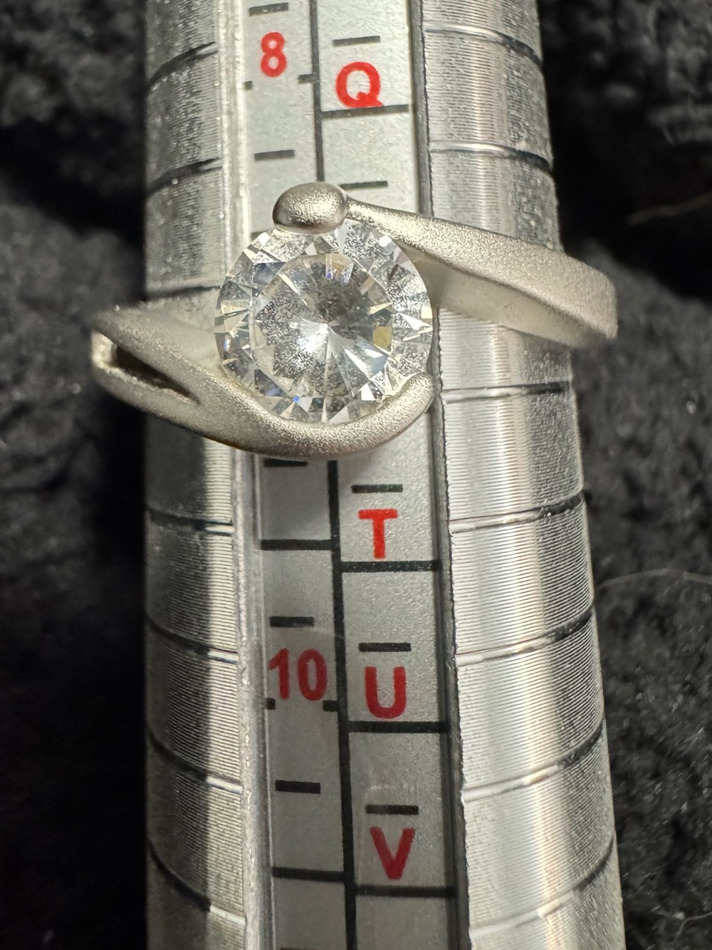 Elegant 18 karat Electroplated Silver Solitaire Ring with Clear Stone